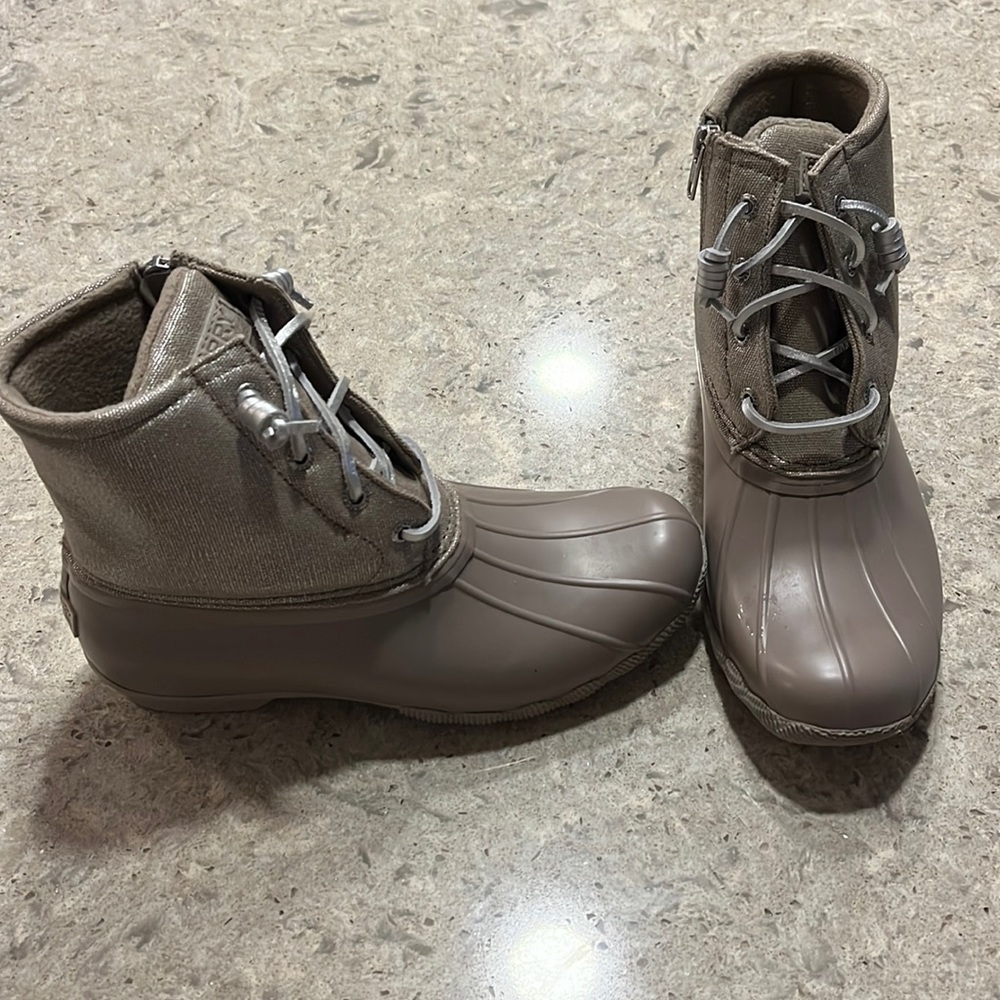 Sperry boots never worn. Ladies size 7 1/2